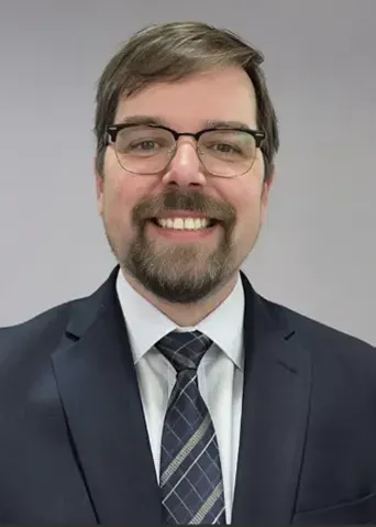 Tom Collins headshot.