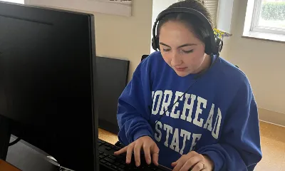 Digital Engagement Center student on phone