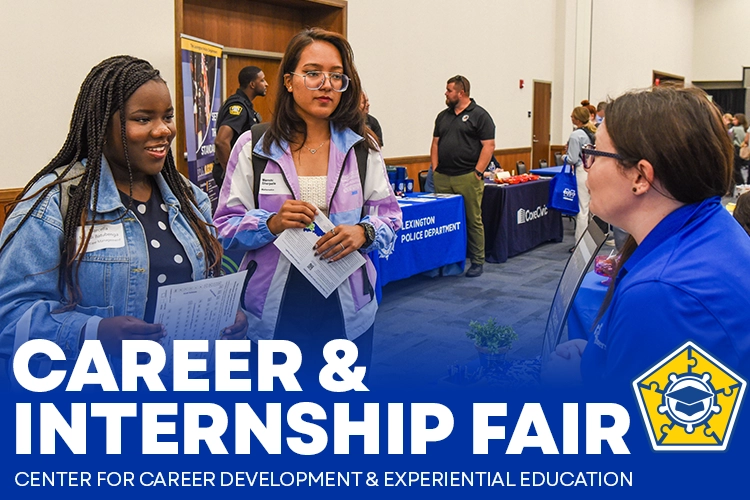 students and employers at career fair
