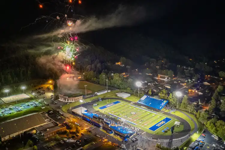 Football game with fireworks over the stadium