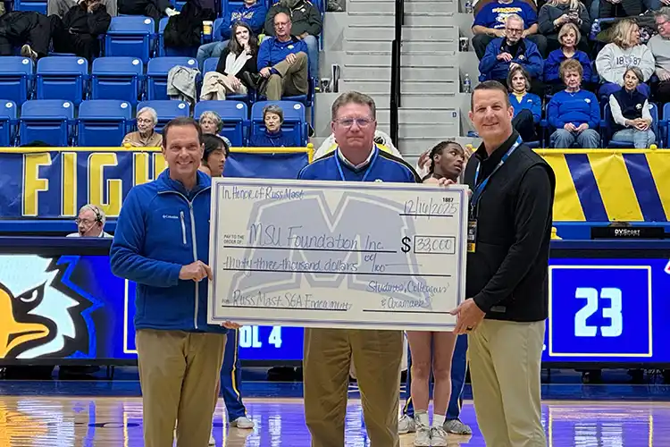 Russ Mast receiving scholarship check