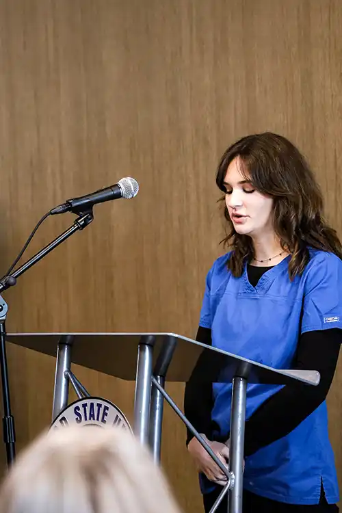 Emma Hardy speaking to crowd