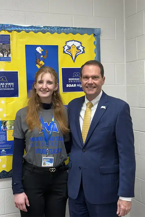 Victoria Daniels and Morehead State President Jay Morgan pose for a photo.