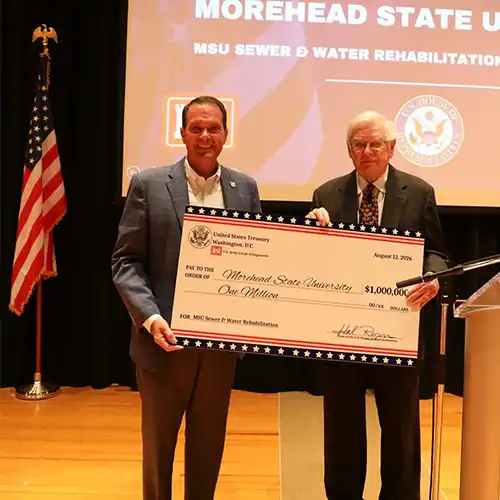 U.S. Congressman Hal Rogers presenting a large check to MSU President Dr. Jay Morgan